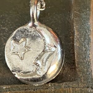 - Peruvian inspired moon face charm pendant